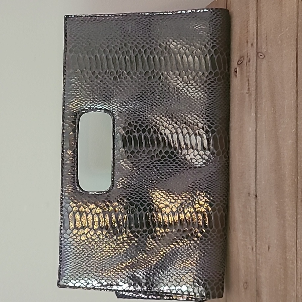 Super cute silver textured clutch